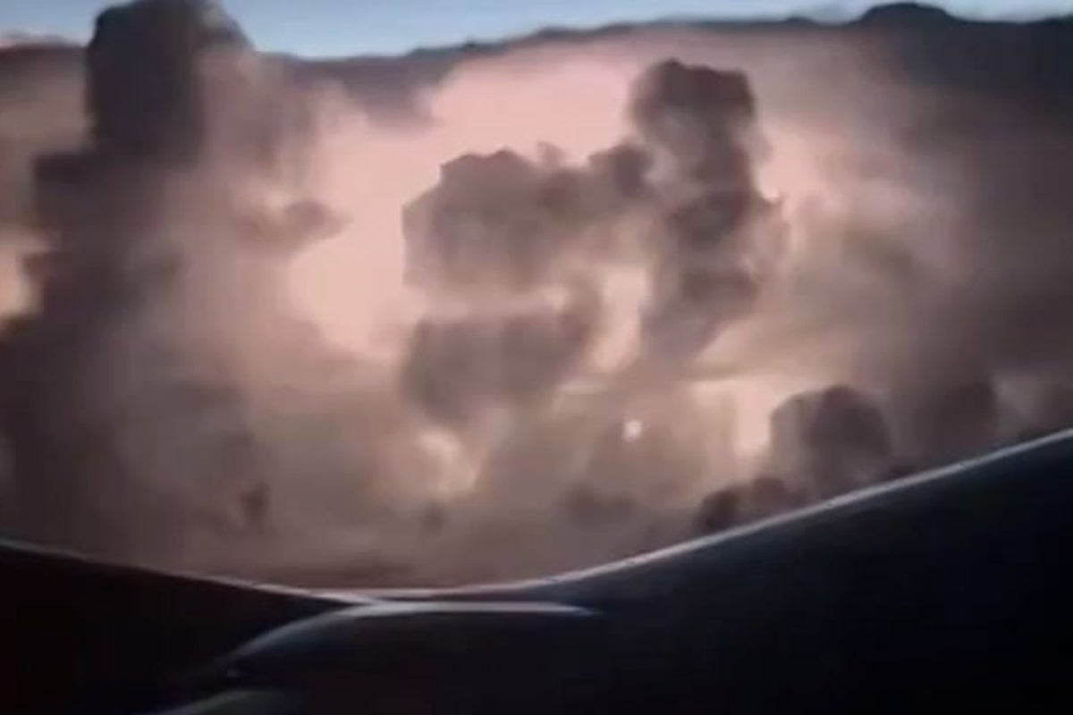 Passengers watch spectacular storm from plane window