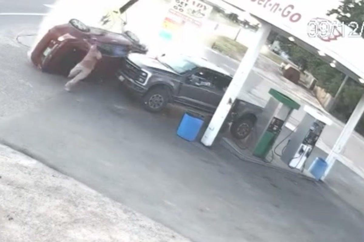 Man has miracle escape after car crashes into gas station