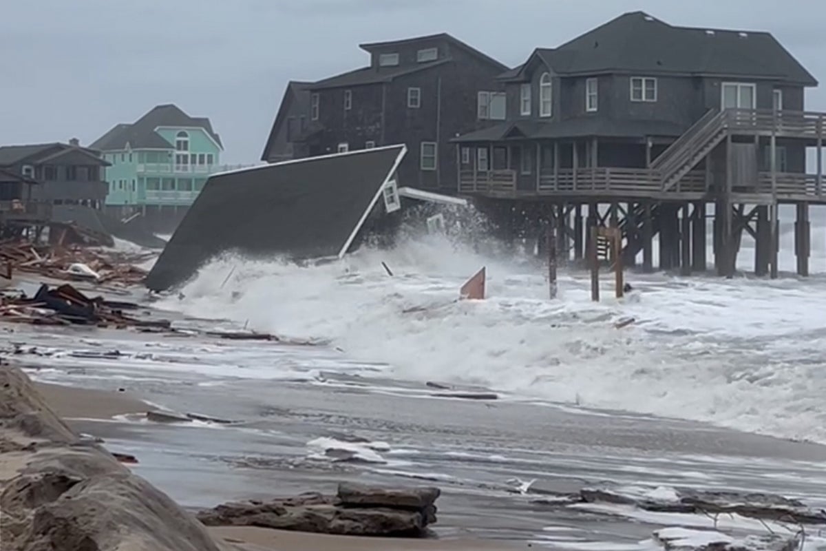 North Carolina homes crumble into ocean as Hurricanes Humberto and Imelda churn massive waves off Atlantic coast