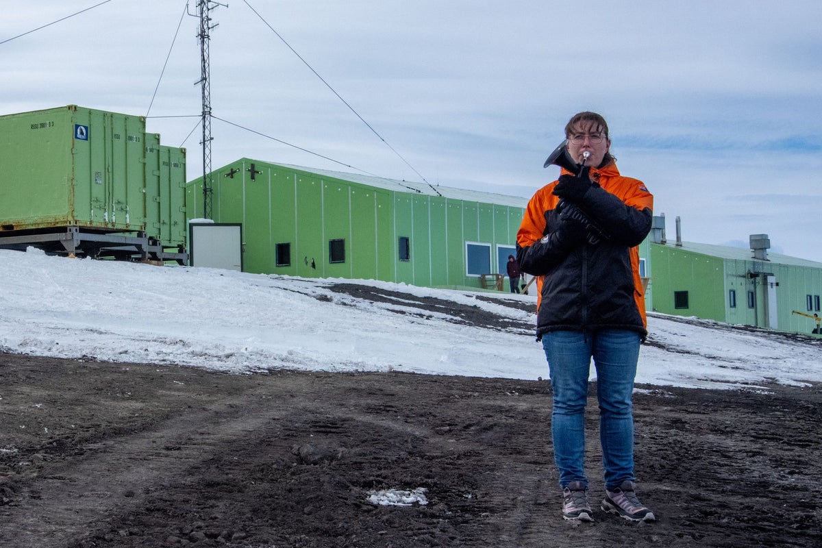 Navy musician plays French horn on the world’s coldest stage