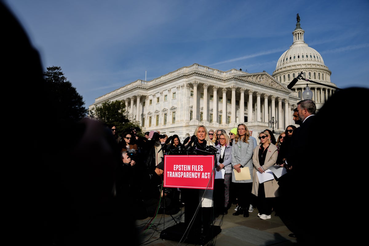 Photos of Marjorie Taylor Greene with Epstein survivors before the vote on releasing files