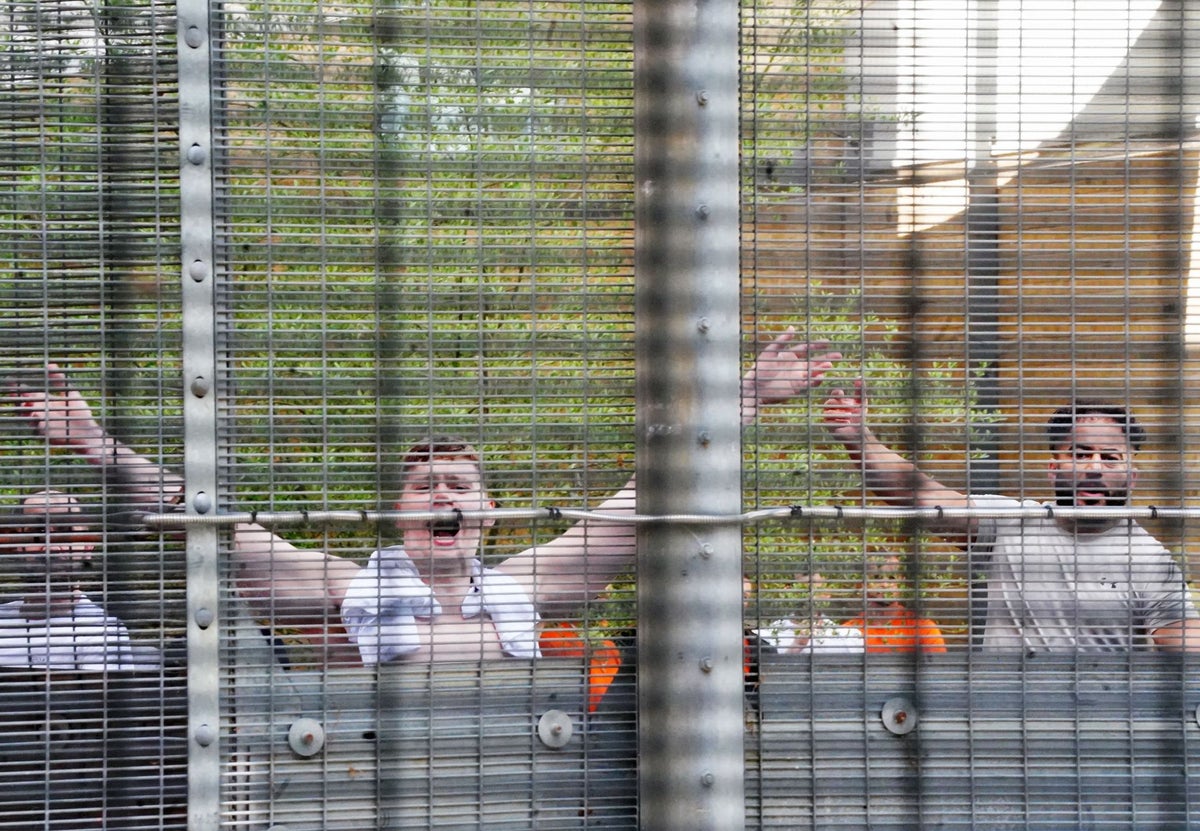 Vulnerable migrants routinely handcuffed and detained for hours, damning report finds